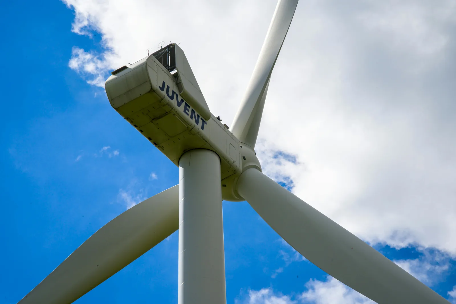 Dramatic stormy sky over a cityscape, symbolizing upheaval in the tech industry
